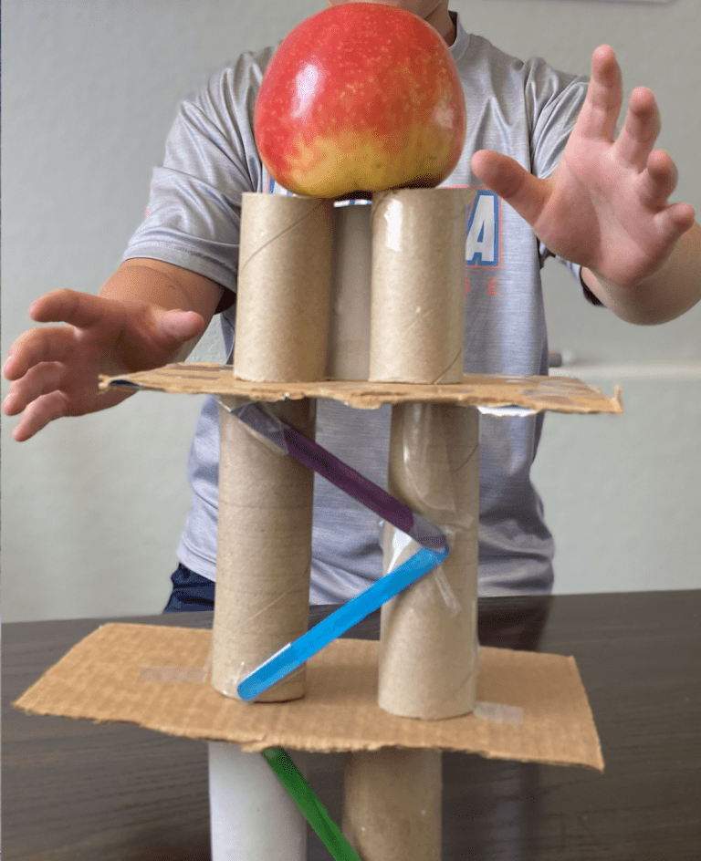 building a tower stem challenge testing with an apple