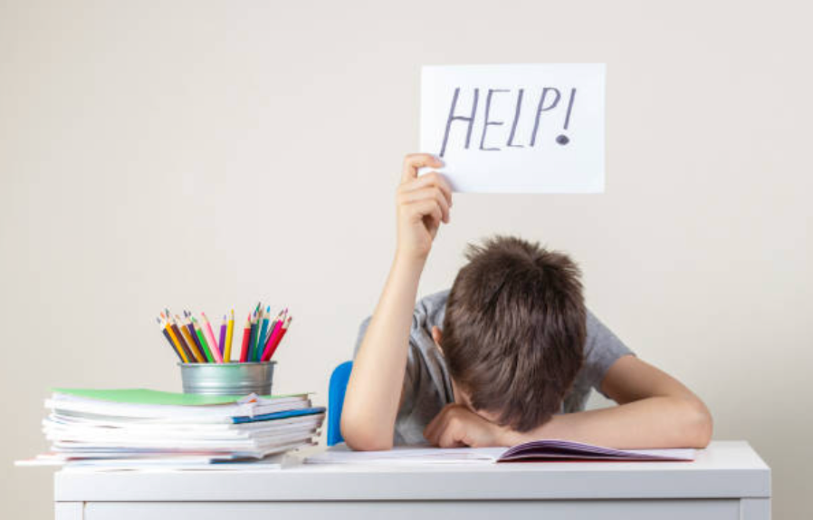 child holding help sign